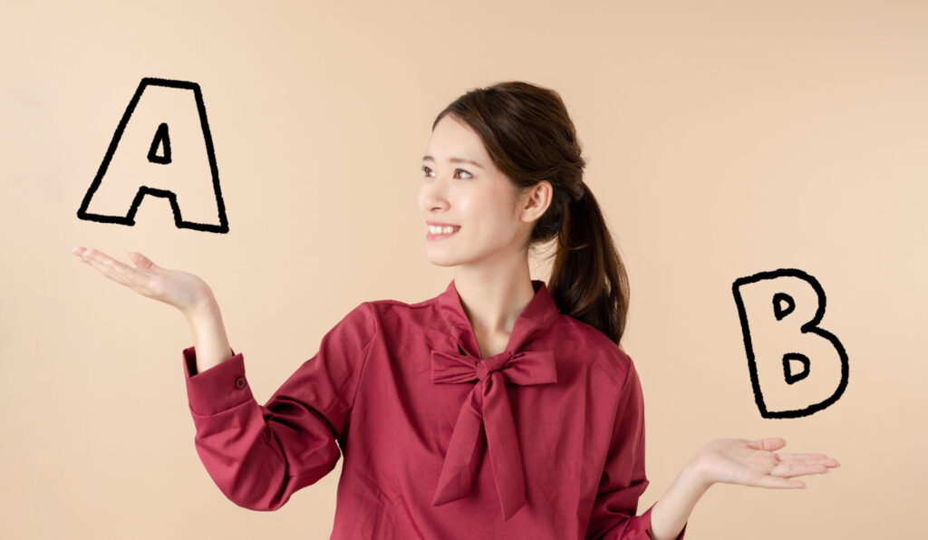 A,Bどちらにするか迷う女性